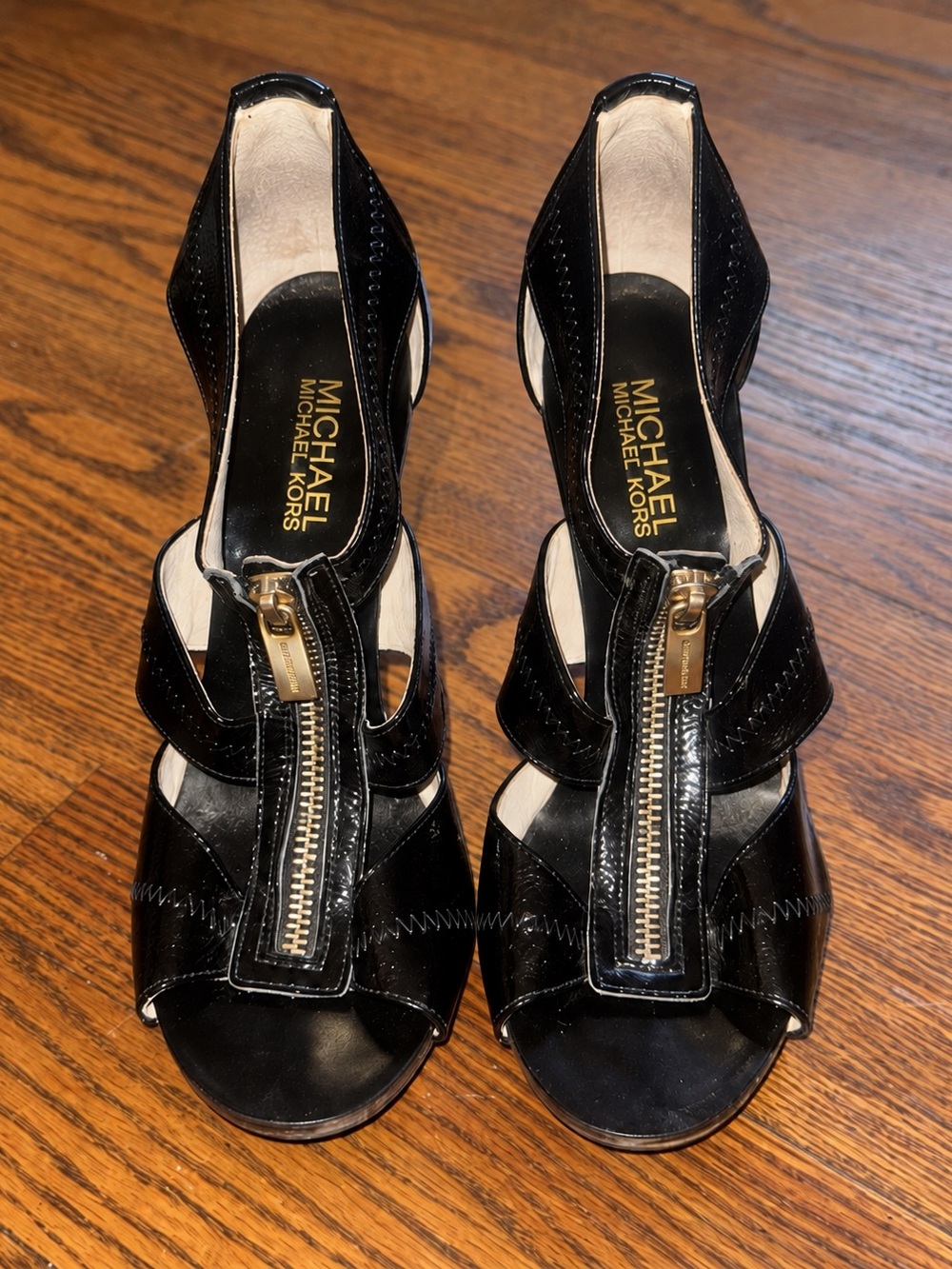 Michael Kors Black Patent Leather Zip-Front Heels with Gold Hardware